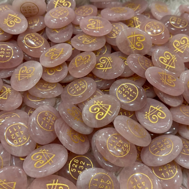 Rose Quartz ZIBU Coins – Healing coins with ZIBU symbols for love and emotional balance.