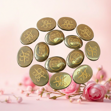 Pyrite ZIBU Coins – Golden healing coins with ZIBU symbols for wealth and prosperity.