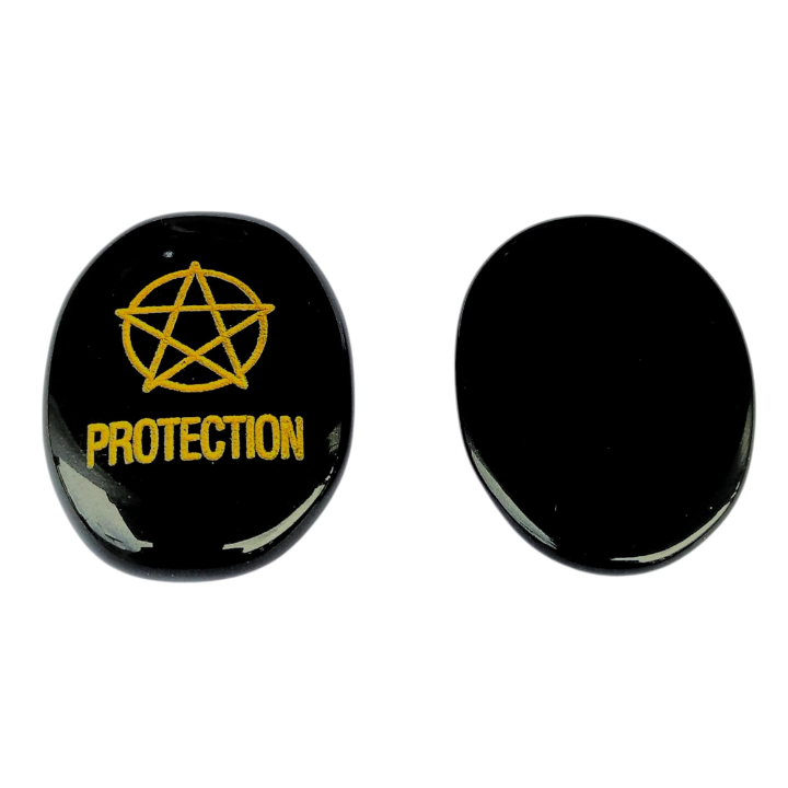 Close-up of Black Tourmaline ZIBU Coins showing sacred ZIBU symbols for grounding and spiritual protection.